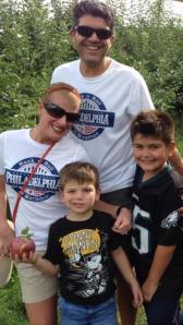 Wearing our race shirts to go apple picking with our boys