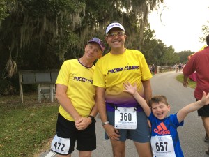 With a fellow Mickey Miler and a junior one