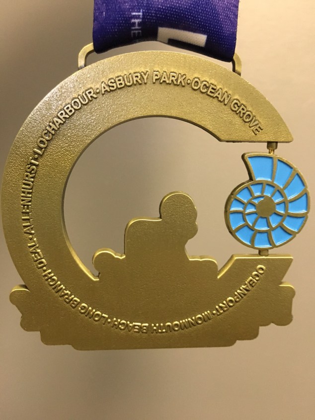 I like the way they list all the towns we ran through on the back of the medal