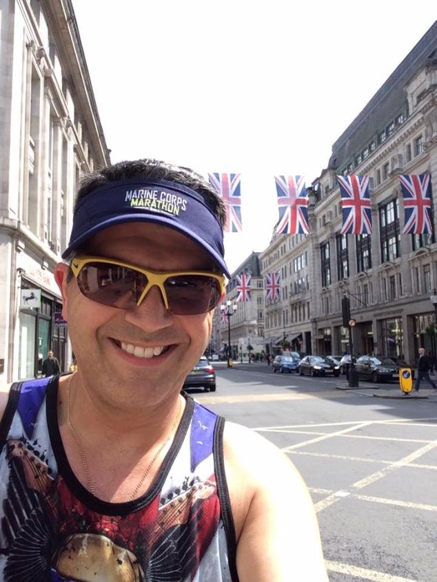 Running along a very busy Oxford Street during a break in the rain