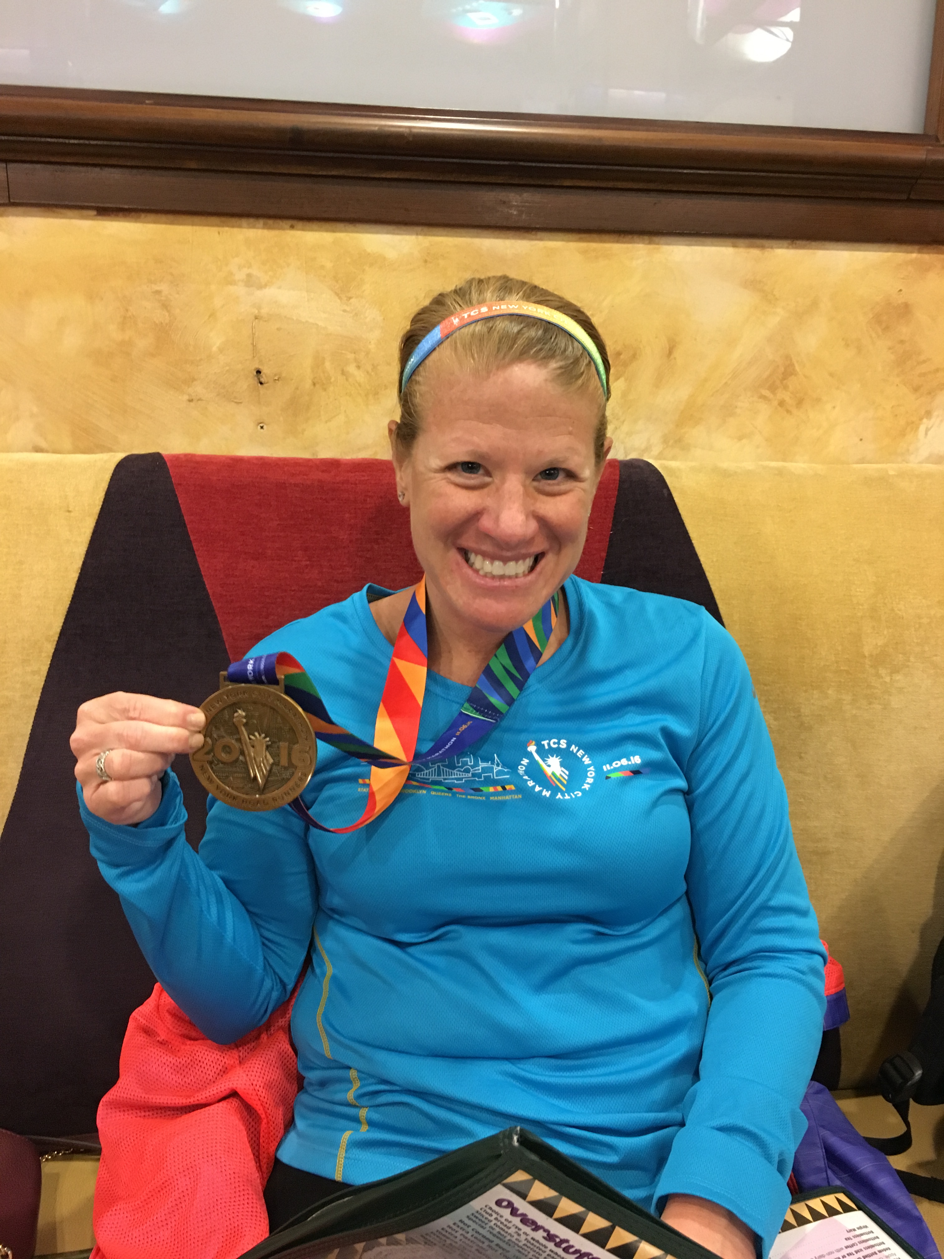 My wife and her NYC Marathon finisher medal